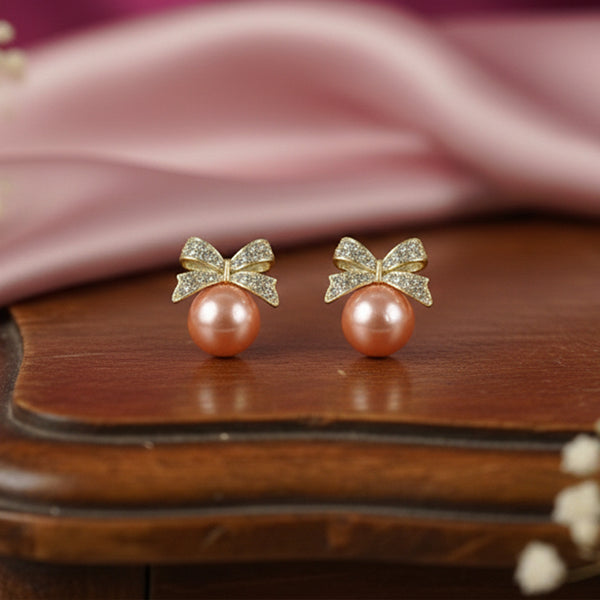 Rose-Gold Bow Studs with Lustrous Peach Pearl Drops